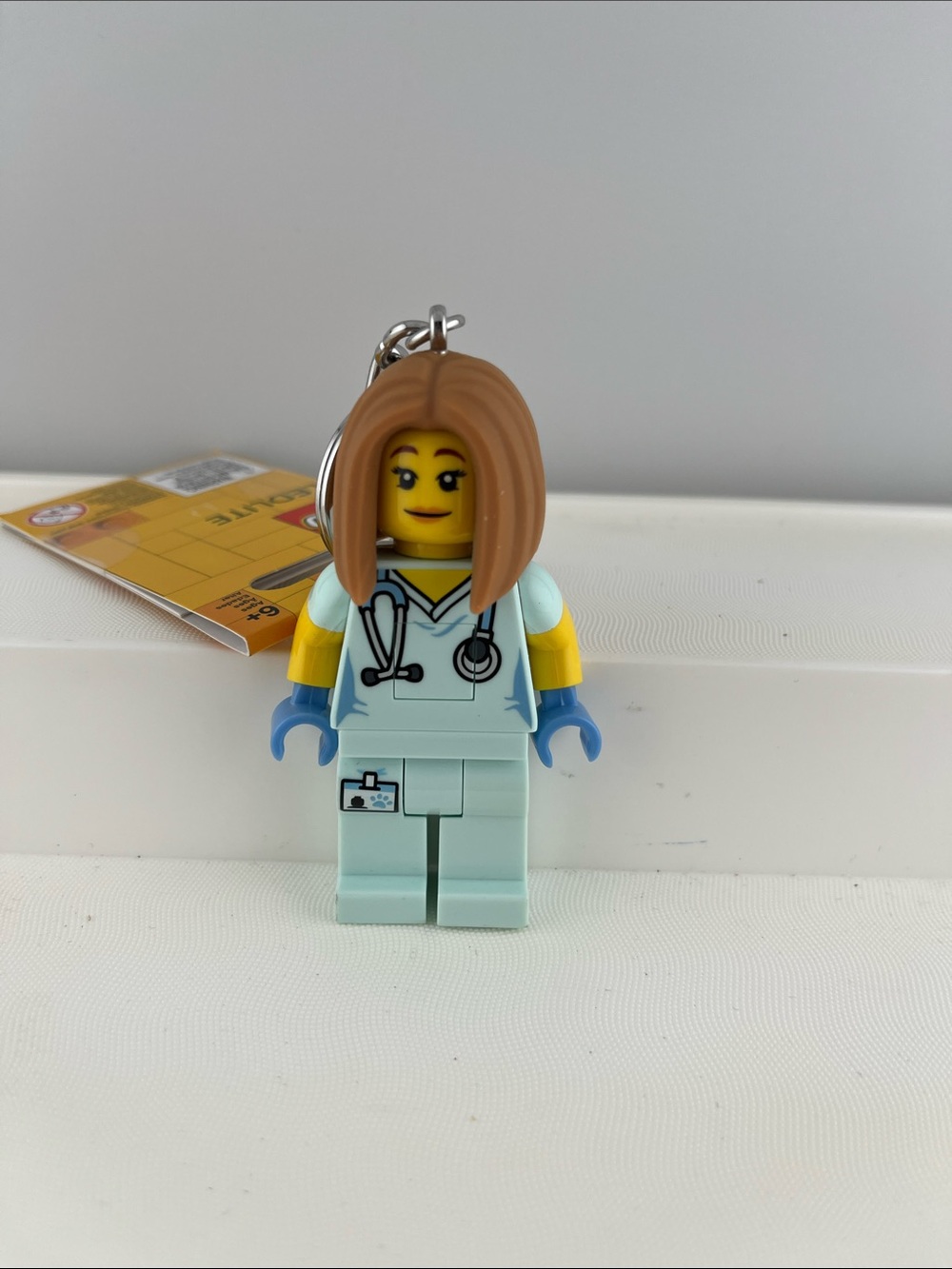 LEGO Minifigure Keychain - Female Nurse in Light Aqua Scrubs